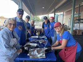 Preparing and serving lunch to the FFA students at Elsie Allen High School