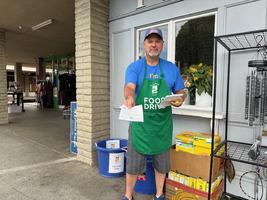 Collecting food donations for Food for Thought in front of Oliver's Market on Montecito Blvd.