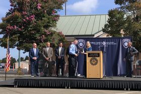 Presenting a Rotary 4-Way Test award to a graduate of the Santa Rosa Public Safety Academy